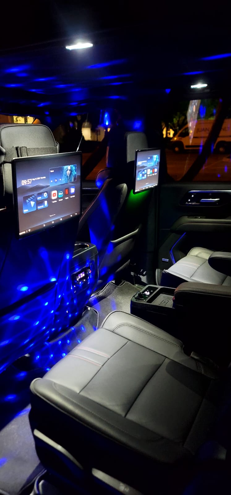 Party lights and screens inside the Suburban